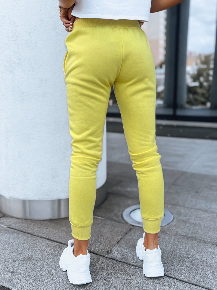 Teplákové žlté nohavice FITS UY0580